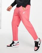 Nike Club - Tapered joggingbukser i lyserød