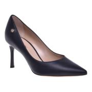 Court shoes in black leather