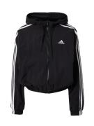 ADIDAS SPORTSWEAR Træningsjakke 'Essentials'  sort / hvid