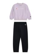 Champion Authentic Athletic Apparel Joggingdragt  pastellilla / rød / sort / hvid