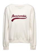 Kids Girls Sweatshirts Tops Sweatshirts & Hoodies Sweatshirts Cream Abercrombie & Fitch
