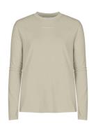 Clara Base Long Sleeve Sport T-shirts & Tops Long-sleeved Beige Röhnisch