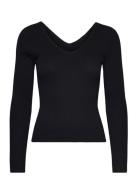 Ribbed Sweater With Low-Cut Back Tops T-shirts & Tops Long-sleeved Black Mango