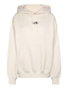 W Essential Over Hoodie Sport Women Sport Clothing Sport Sweatshirts & Hoodies Sport Hoodies Cream The North Face