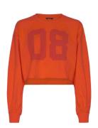 Cropped Long-Sleeved T-Shirt Tops T-shirts & Tops Long-sleeved Orange Monki